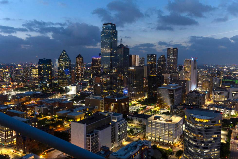 The city skyline lights up as if it was night a totality happens during the total solar eclipse ...