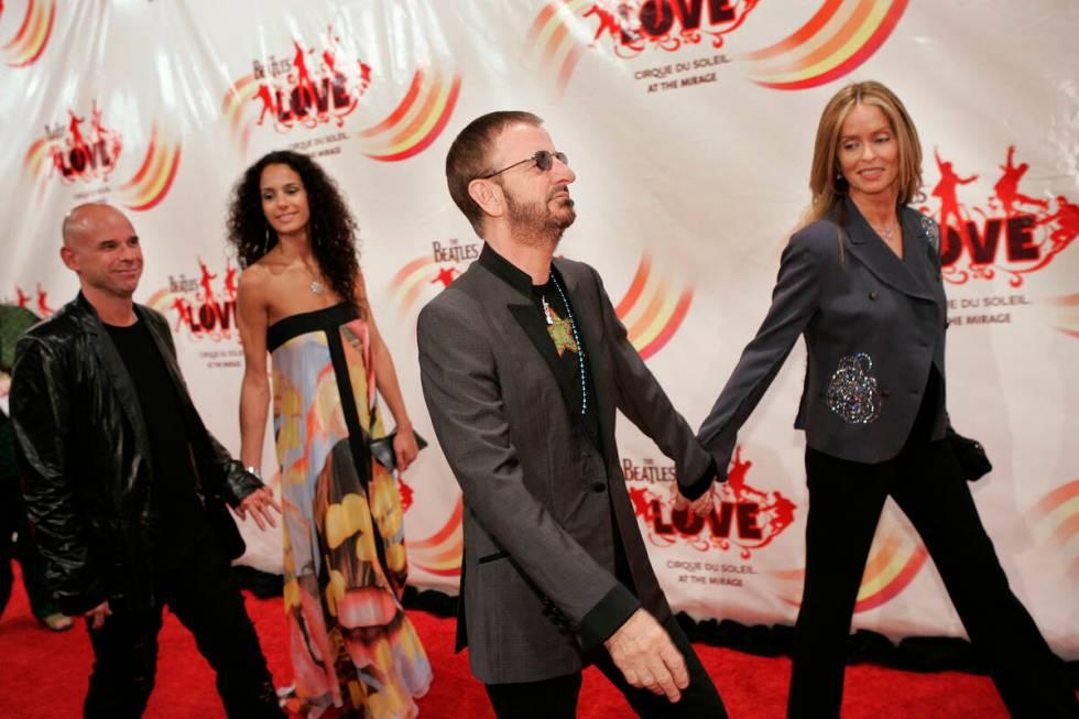 From right Barbara Bach, Ringo Starr, an unidentified woman and Guy Laliberte walk the red carp ...