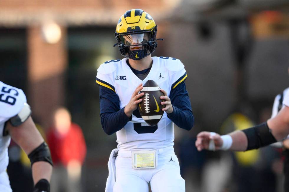 Michigan quarterback J.J. McCarthy (9) in action during the second half of an NCAA college foot ...