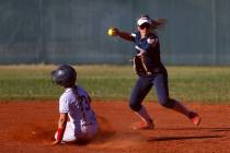 Coronado's Bailey Goldberg, right, throws to first base after outing Liberty's Ciana Cubi (3) d ...