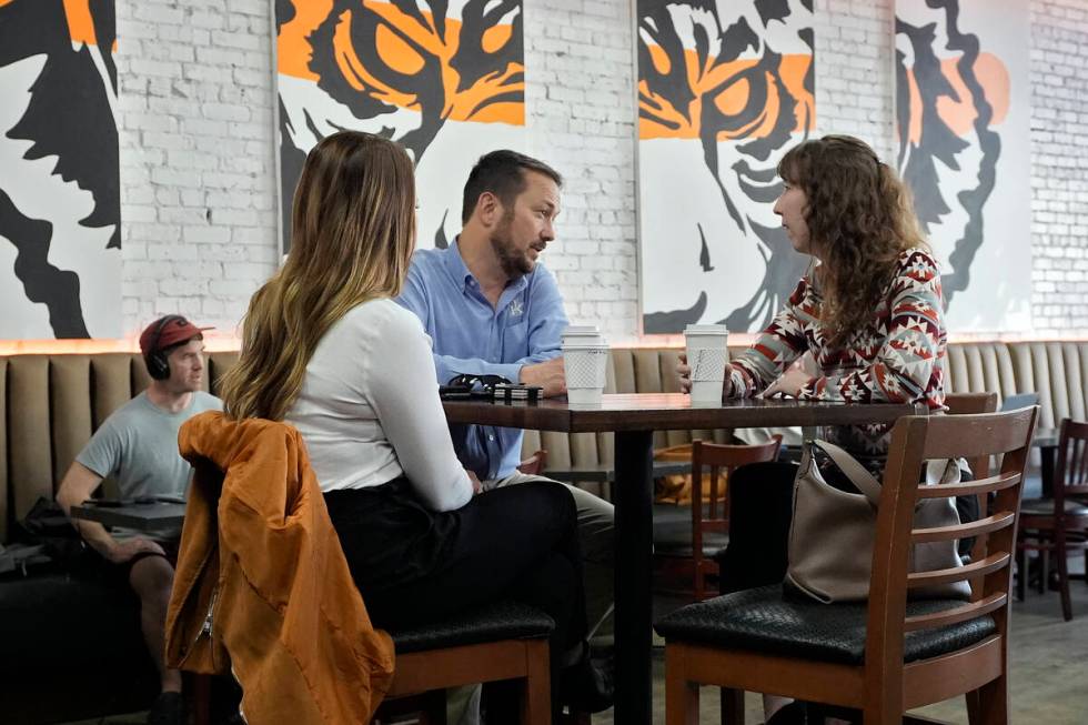 Customers drink coffee at the Blind Tiger Cafe Jan. 10, 2024, in Tampa, Fla. On Wednesday, Apri ...