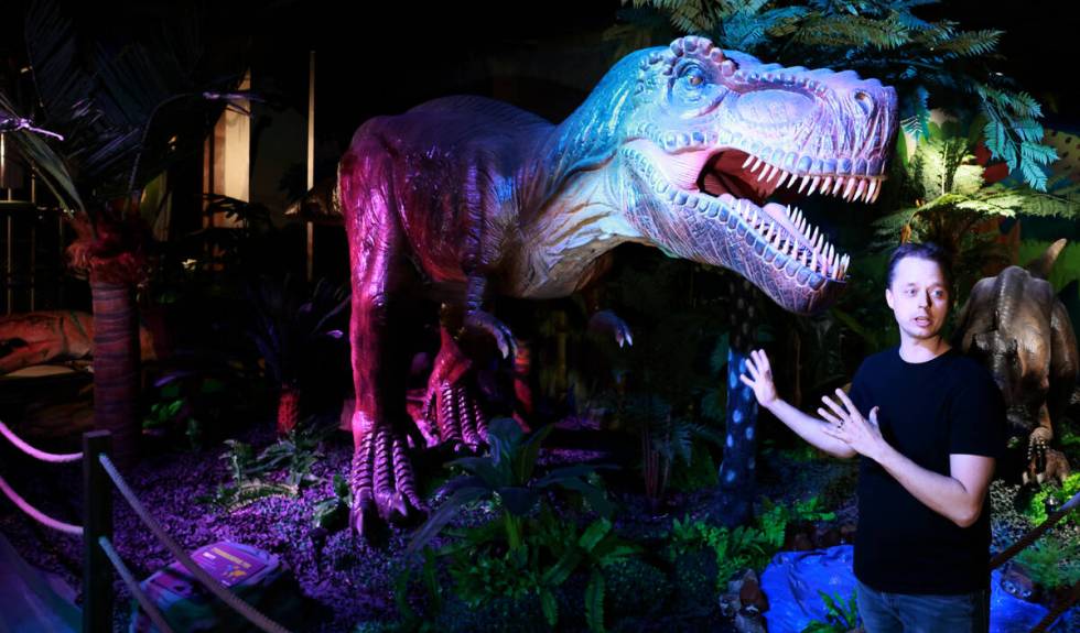 Founder and owner Tim Clothier, posing with a Tyrannosaurus rex who will get a name after a con ...