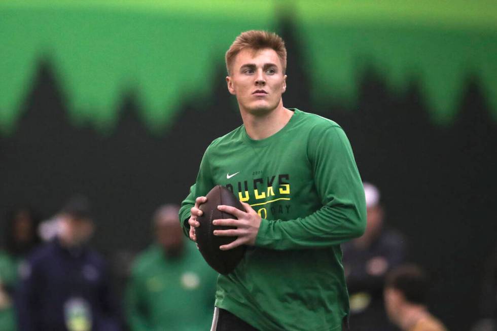 Oregon quarterback Bo Nix warms up before a position drill at the school's NFL Pro Day, Tuesday ...
