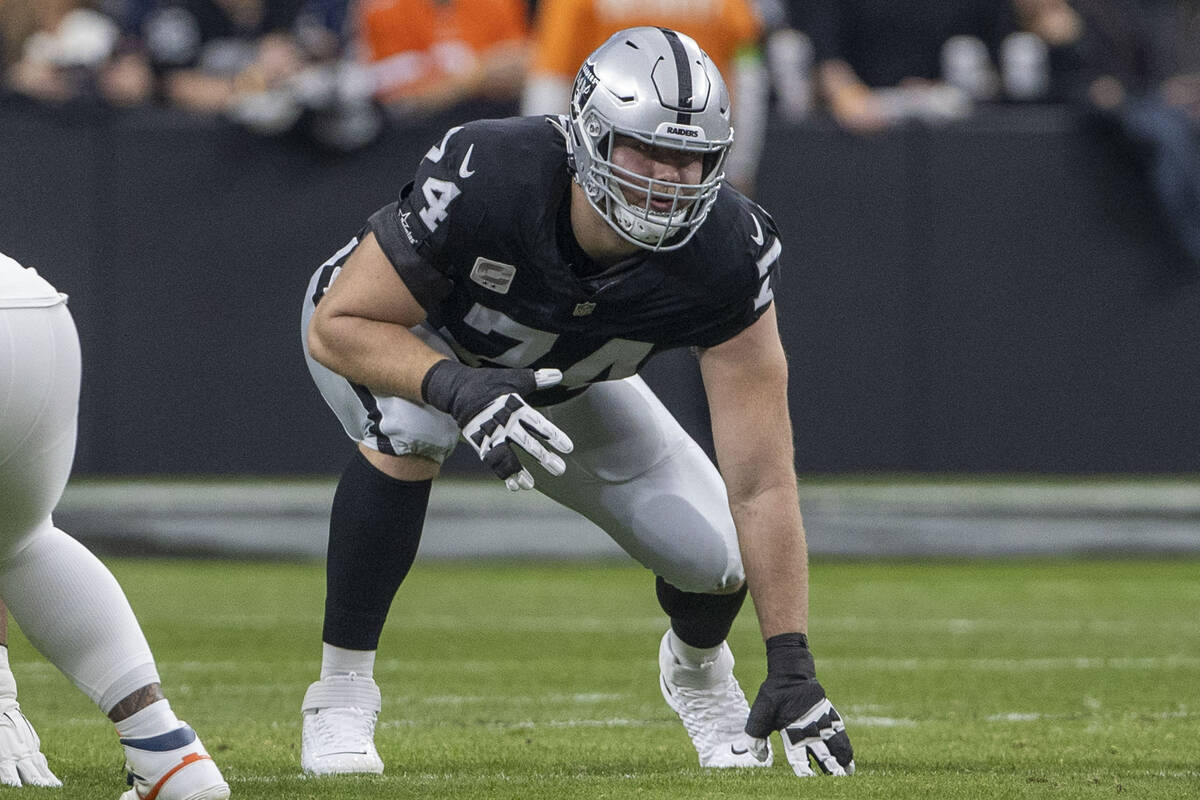 Raiders offensive tackle Kolton Miller (74) gets set on the line of scrimmage during the first ...