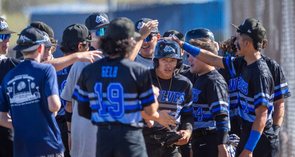 Basic runner Ty Southisene is celebrated for another score against Spring Valley during the sec ...