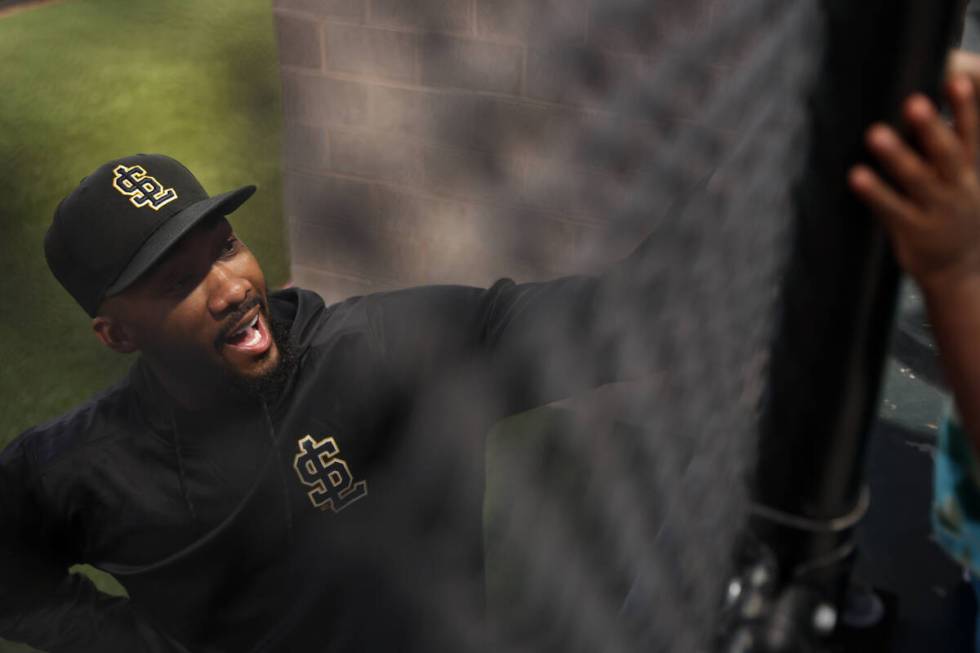 Salt Lake City Bees relief pitcher Amir Garrett hangs out with little ones during a Minor Leagu ...