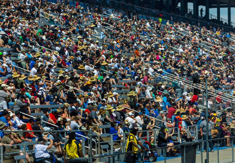 Fans watch the racing during Day 1 of NHRA 4-Wide Nationals on "The Strip" at the Las ...