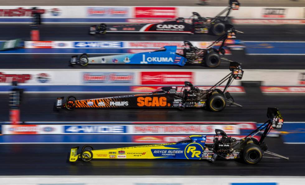 (Bottom to top) Top Fuel drivers Tony Stewart, Justin Ashley, Tony Schumacher and Billy Torrenc ...