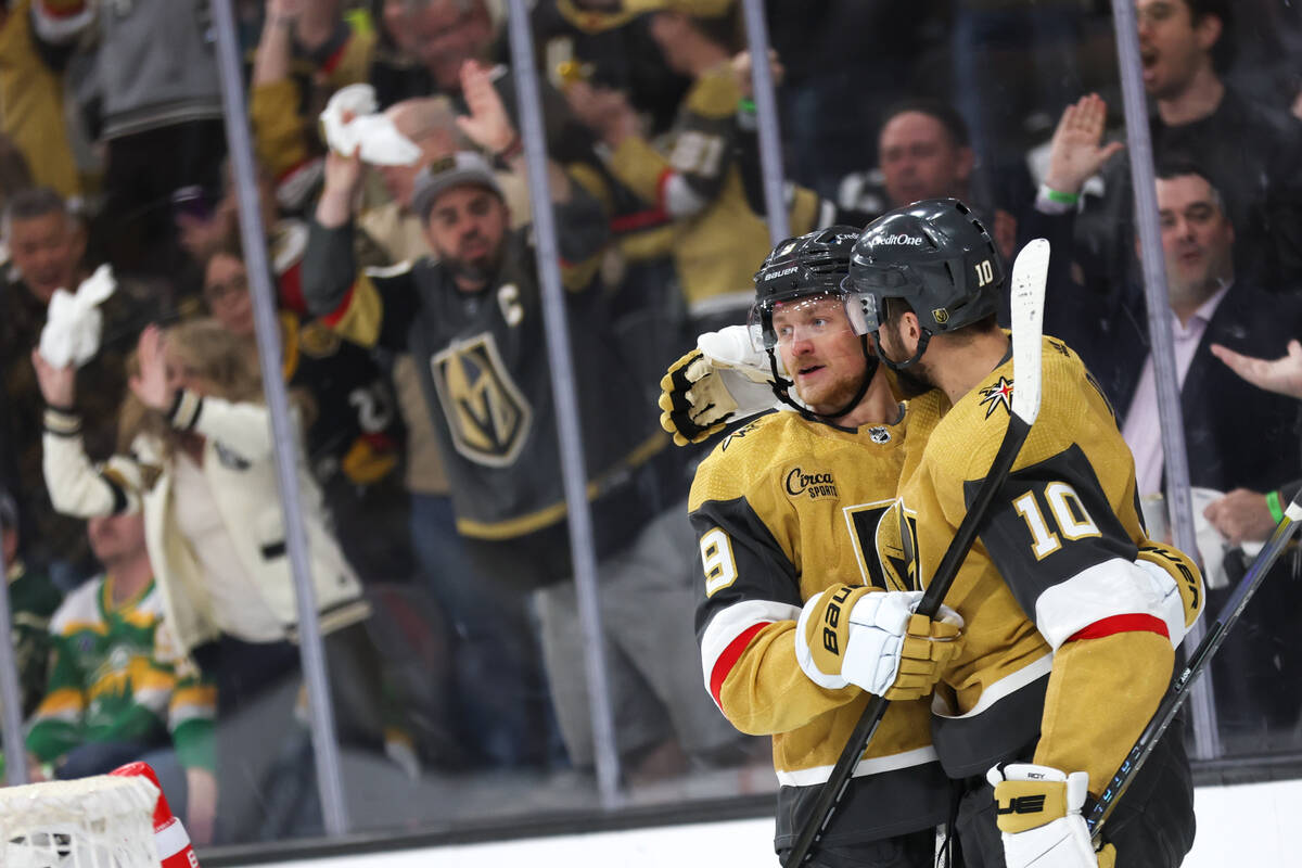 Golden Knights center Jack Eichel (9) and center Nicolas Roy (10) celebrate a goal during the f ...