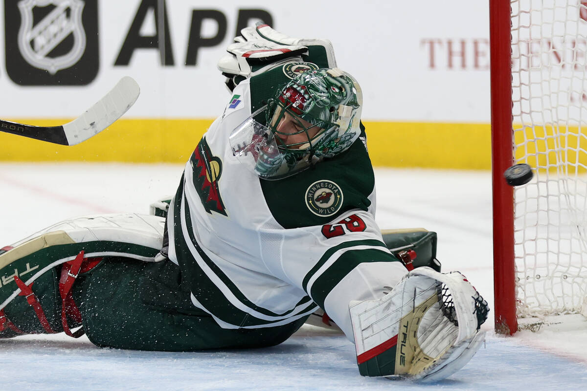 Wild goaltender Marc-Andre Fleury (29) dives but misses the puck during the third period of an ...