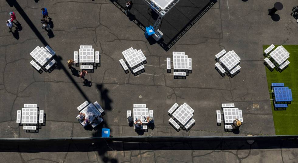 Fans relax in the Nitro Cafe hospitality area during Day 2 of NHRA 4-Wide Nationals on "Th ...