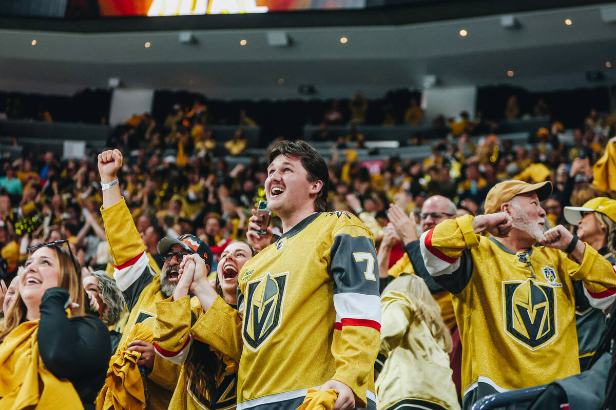 Golden Knights fans celebrate an overtime win during an NHL hockey game between the Golden Knig ...