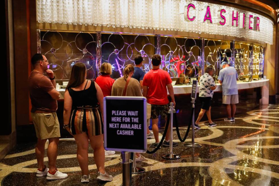 A line forms at The Cosmopolitan of Las Vegas’ cashier booth on Saturday, Sept. 16, 2023, in ...