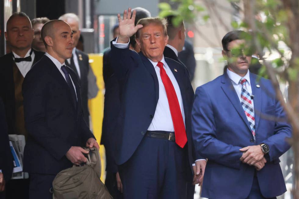 Former President Donald Trump leaves Trump Tower on his way to Manhattan criminal court, Monday ...