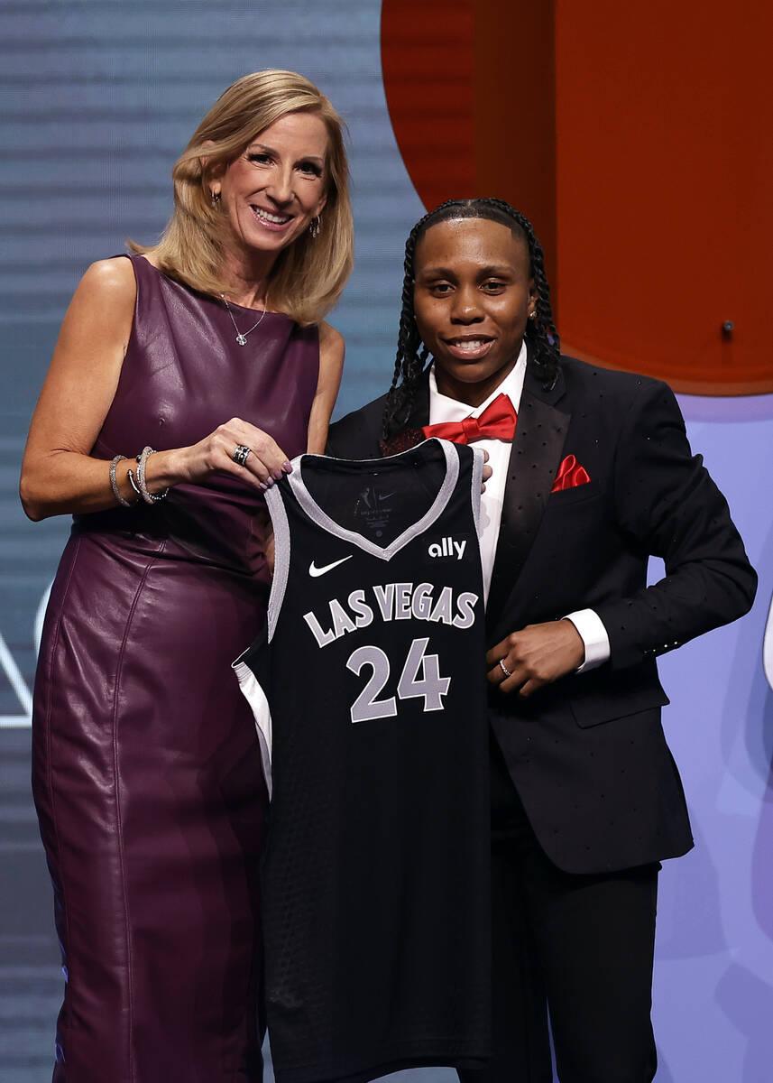 Syracuse's Dyaisha Fair, right, poses for a photo with WNBA commissioner Cathy Engelbert, left, ...