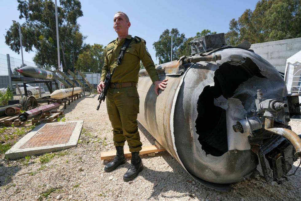 Israeli military spokesperson, Rear Adm. Daniel Hagari, displays to the media one of the Irania ...