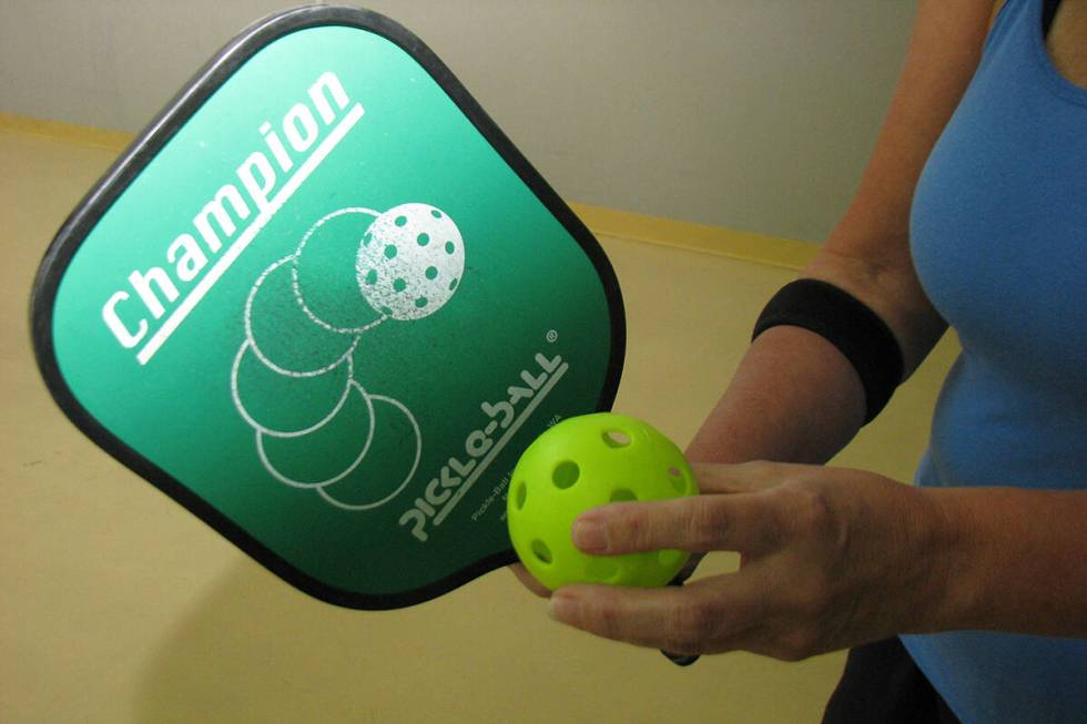 The tools of the sport for pickleball are the pickleball paddle and ball. (Las Vegas Review-Jou ...