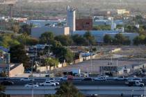Motorists on U.S. Highway 95 in downtown Las Vegas past a city owned building that once housed ...