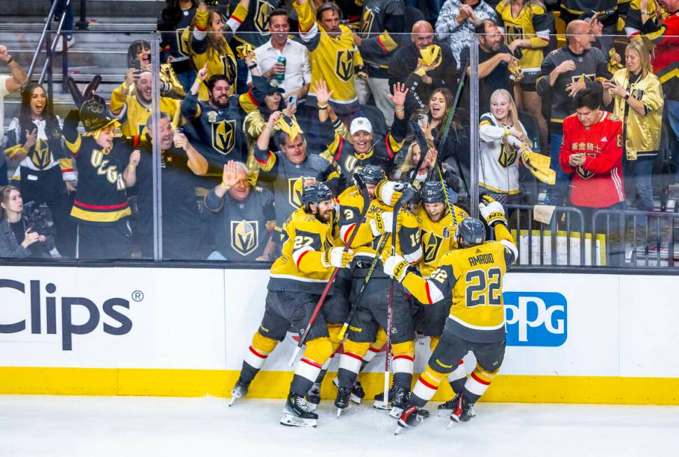 Golden Knights center William Karlsson (71) and teammates celebrate a goal against Florida Pant ...