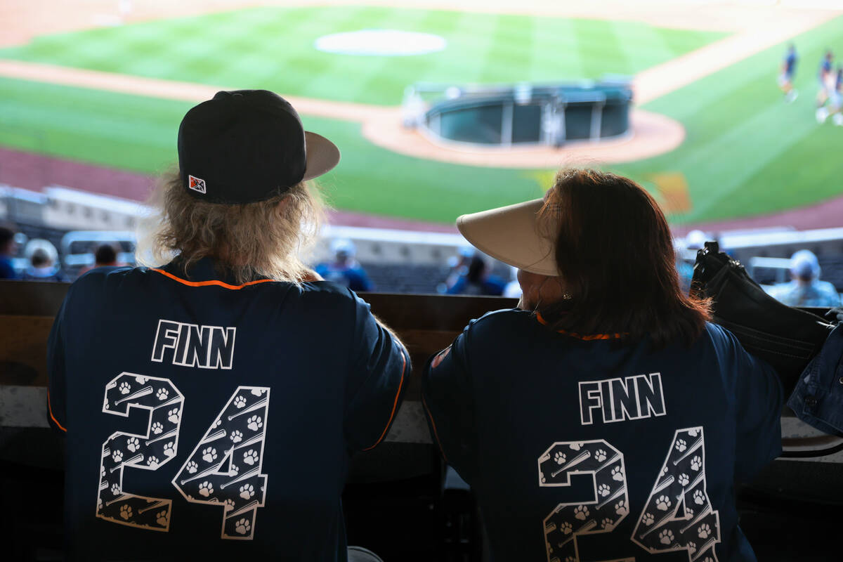 Fans wear Finn the Bat Dog jerseys on the night of his retirement as the Las Vegas Aviators&#x2 ...