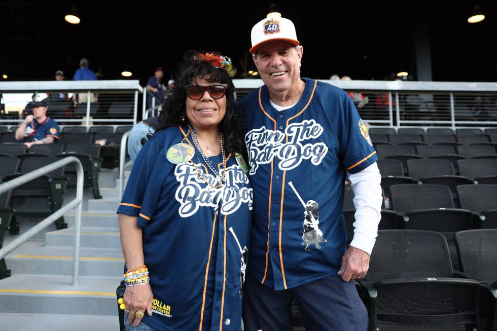 Mercedes and Joseph Yeoman, of St. George, Utah, pose with their Finn the Bat Dog jerseys befor ...