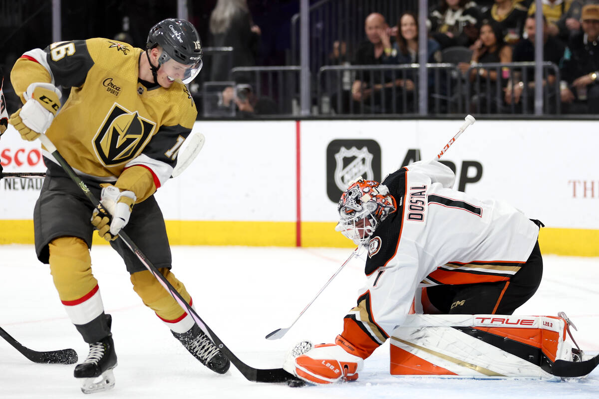 Golden Knights left wing Pavel Dorofeyev (16) battles at the net with Ducks goaltender Lukas Do ...