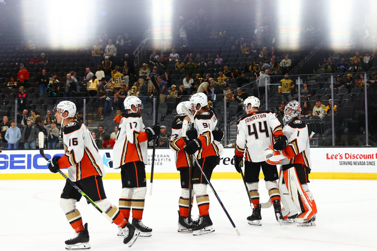 The Ducks celebrate after winning an NHL hockey game against the Golden Knights at T-Mobile Are ...