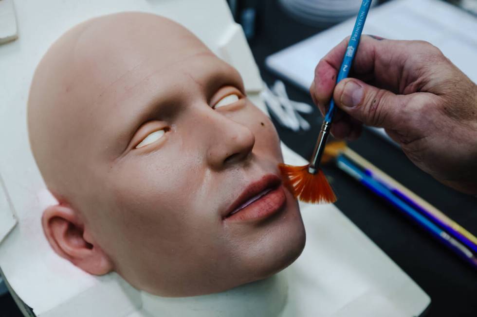 It takes one-to-two weeks for McMullen to sculpt the face of one of his robots. (Rachel Aston/L ...