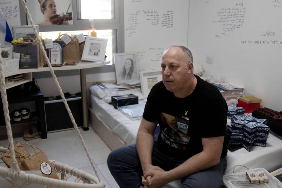 Shlomi Berger sits in his daughter's bedroom in Holon, Israel, Wednesday, April 17, 2024. Agam, ...