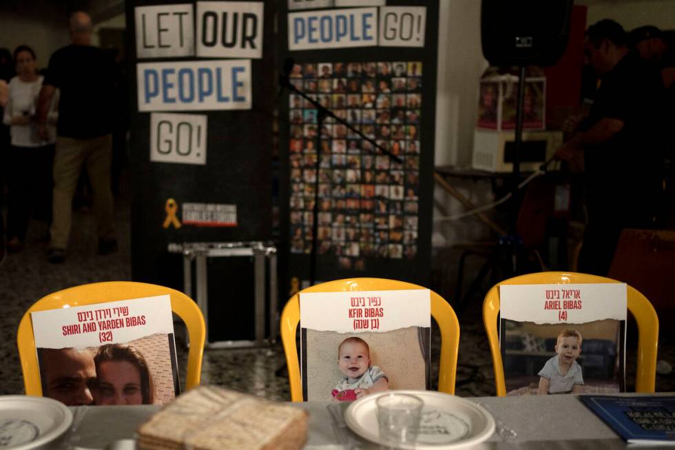 Chairs are set for missing members of the Bibas family who are held hostage in Gaza at a Passov ...