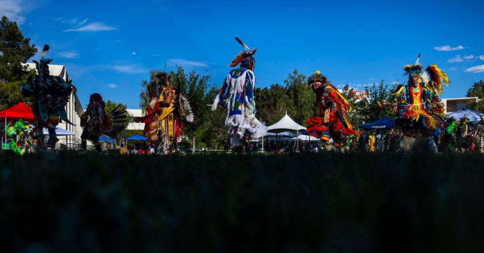 Dancers move about the grounds while performing for the crowd during the Powwow for the Planet ...