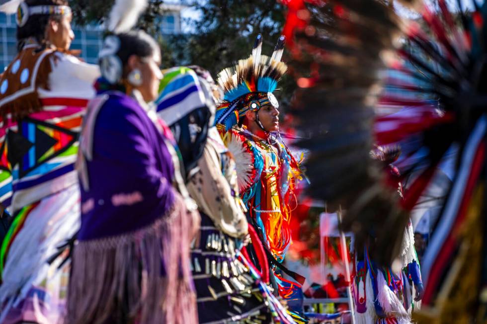 Dancers move about the grounds while performing for the crowd during the Powwow for the Planet ...