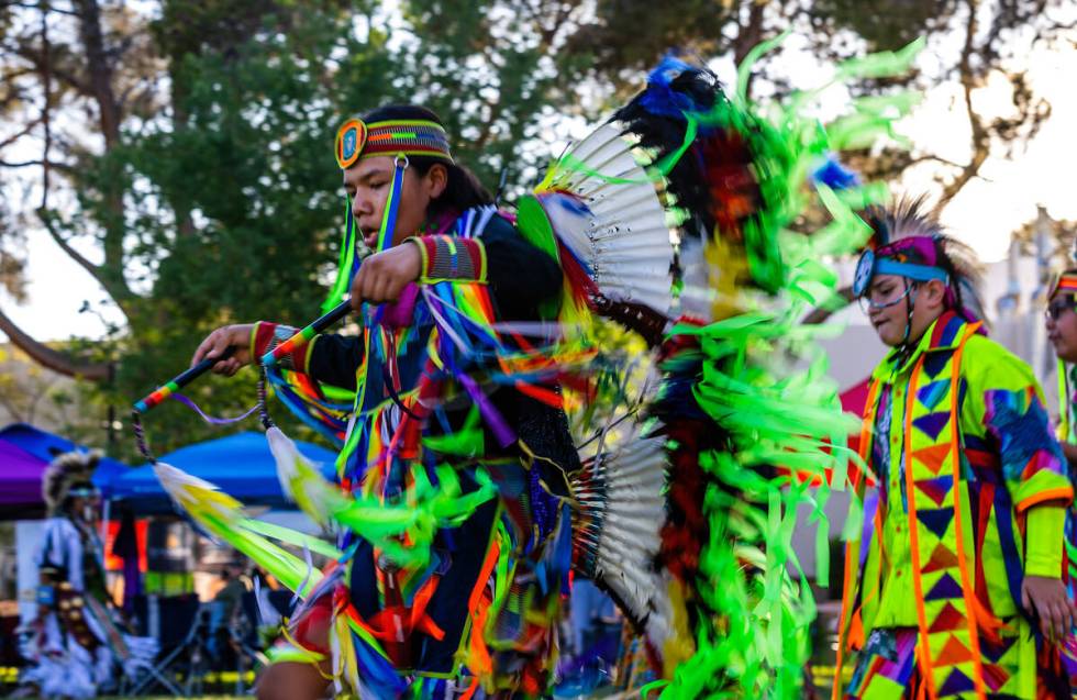 Dancer Tyrell Phillips, 14, with the Dine tribe from Phoenix, performs on the grounds with othe ...