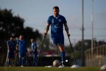 The soccer player of Israel Amputee Football Team, Ben Binyamin controls the ball during a prac ...