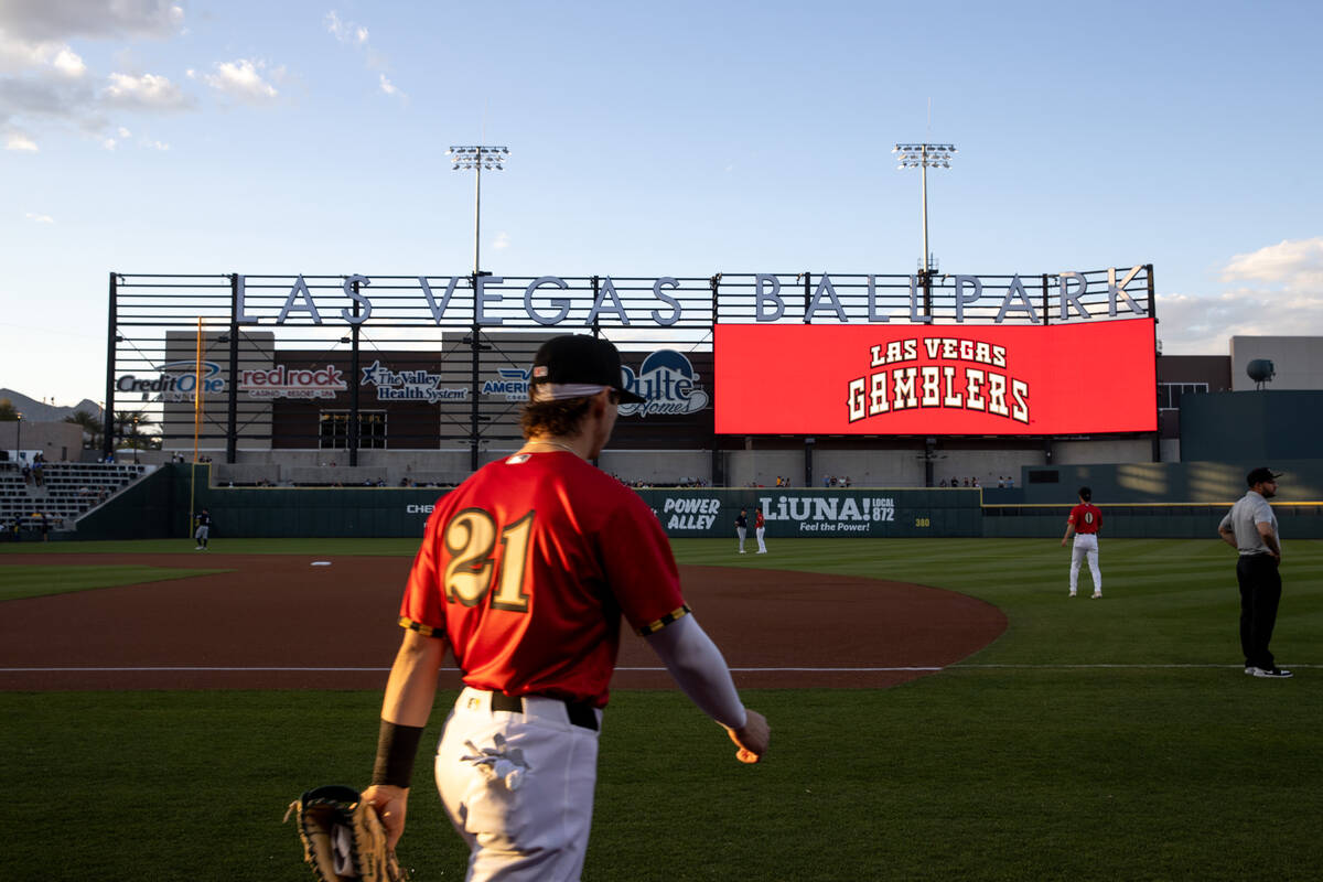 Las Vegas Aviators catcher Tyler Soderstrom (21), wearing a Las Vegas Gamblers jersey, walks on ...
