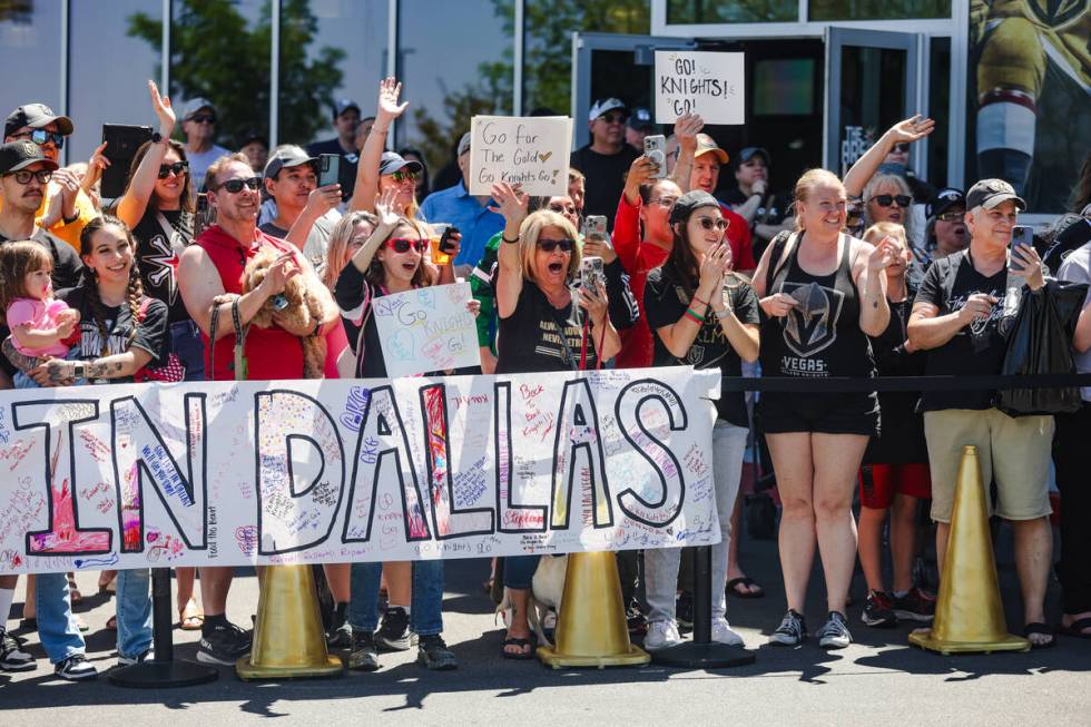 Fans cheer as Golden Knights players depart for Dallas for the start of the Stanley Cup playoff ...