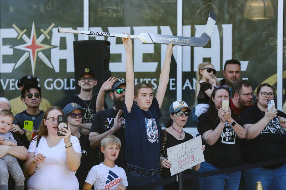 Fans cheer as Golden Knights players depart for Dallas for the start of the Stanley Cup playoff ...