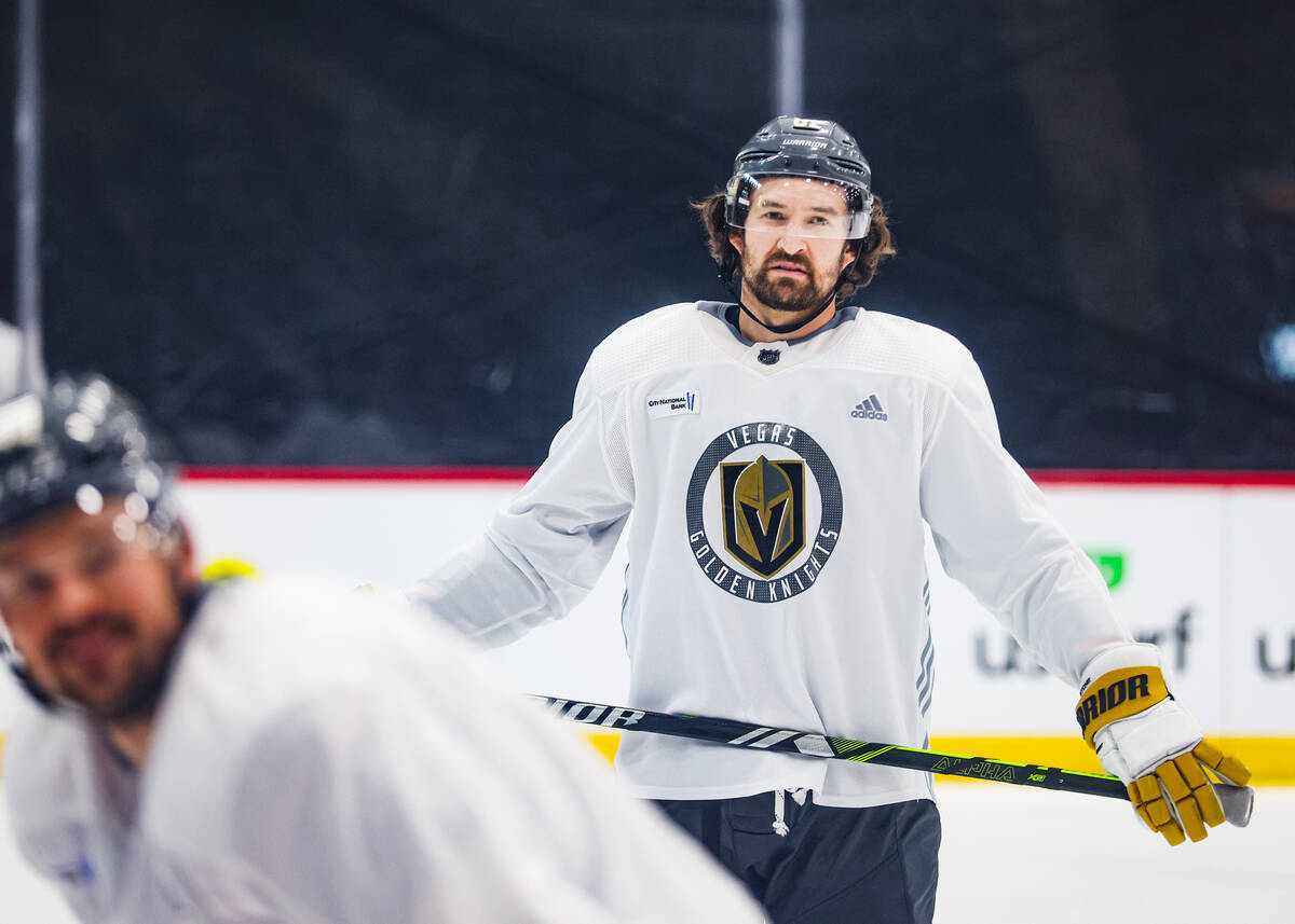 Golden Knights right wing Mark Stone listens to a coach speak during practice at National City ...