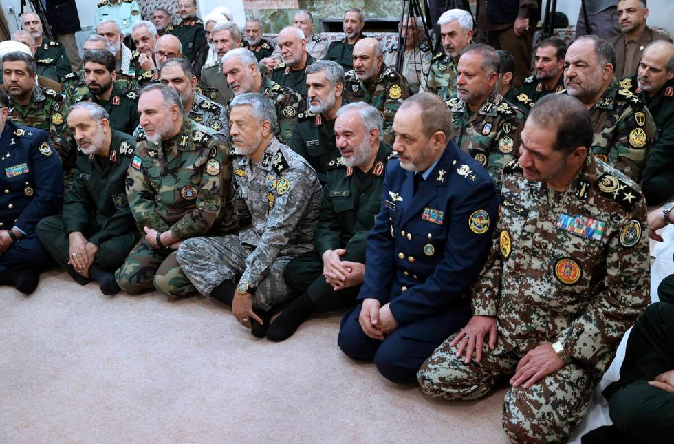 In this photo released by an official website of the office of the Iranian supreme leader, a gr ...