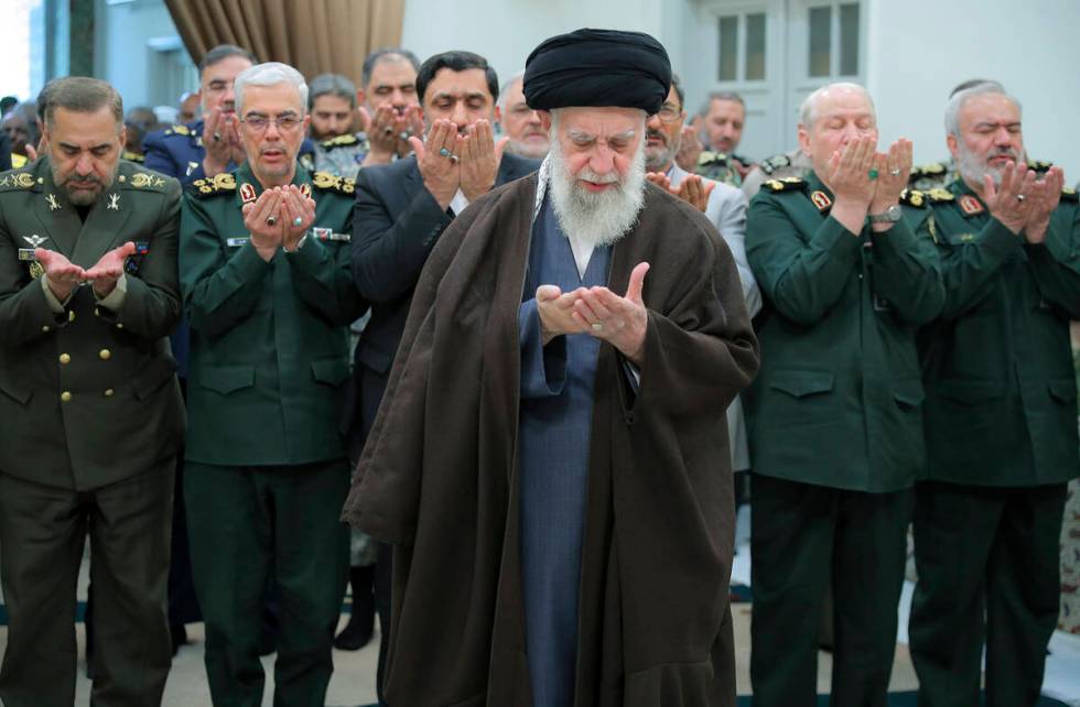 In this photo released by the official website of the office of the Iranian supreme leader, Sup ...