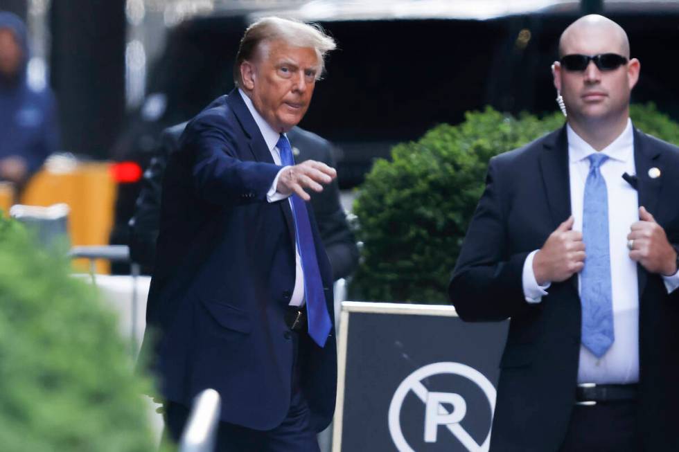 Former president Donald Trump leaves Trump Tower on his way to Manhattan criminal court, Monday ...