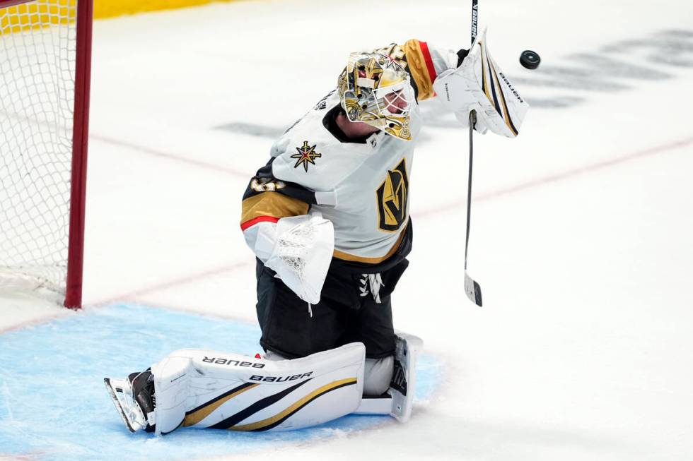 Vegas Golden Knights goaltender Logan Thompson blocks a shot from the Dallas Stars in the third ...