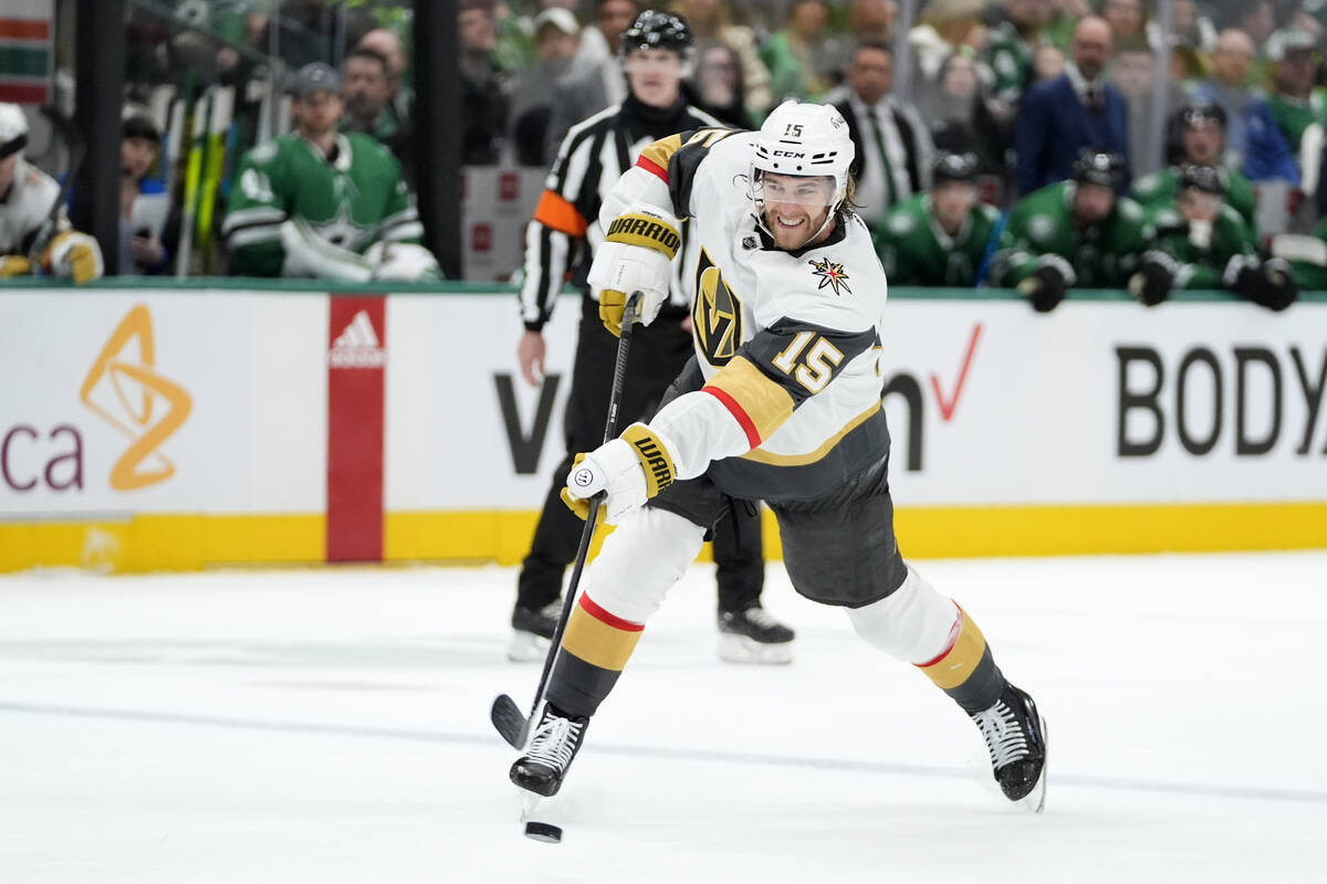 Vegas Golden Knights defenseman Noah Hanifin (15) shoots against the Dallas Stars in the secon ...