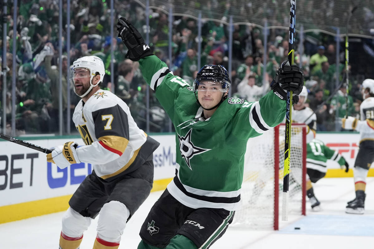 Dallas Stars left wing Jason Robertson (21) celebrates after his goal in front of Vegas Golden ...