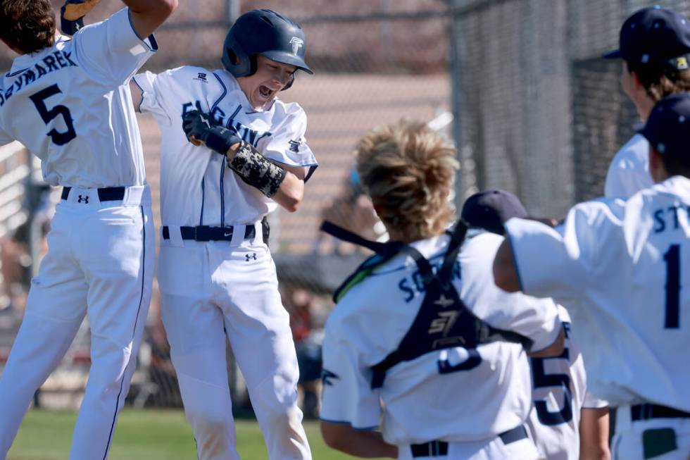 Foothill’s Jakob Hanson (1), second from left, celebrates a home run against Green Valle ...