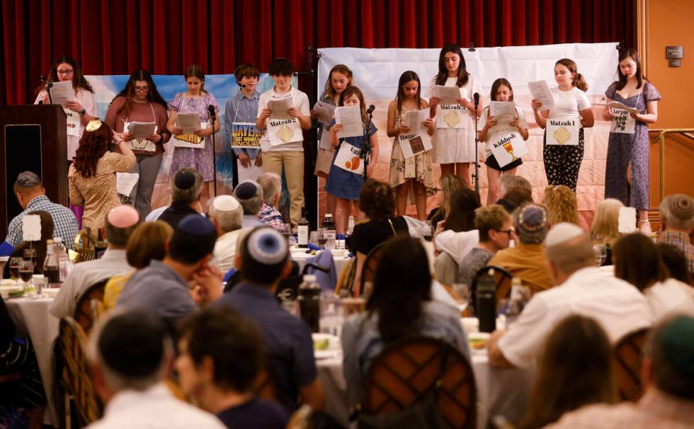 Children perform during a Passover Seder meal at Congregation Ner Tamid on Monday, April 22, 20 ...