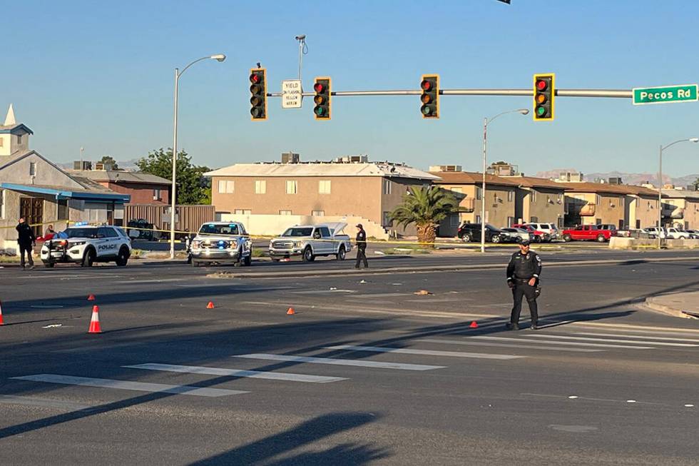 Police investigate a deadly crash Tuesday, April 23, 2024, at the intersection of North Pecos R ...