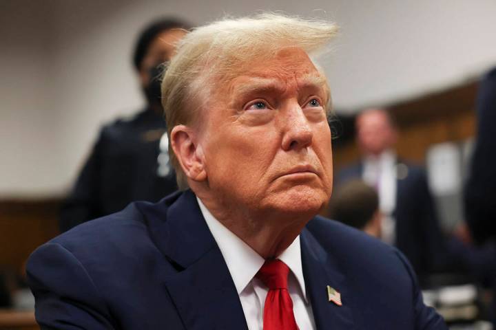 Former president Donald Trump waits for the start of proceedings in Manhattan criminal court, T ...