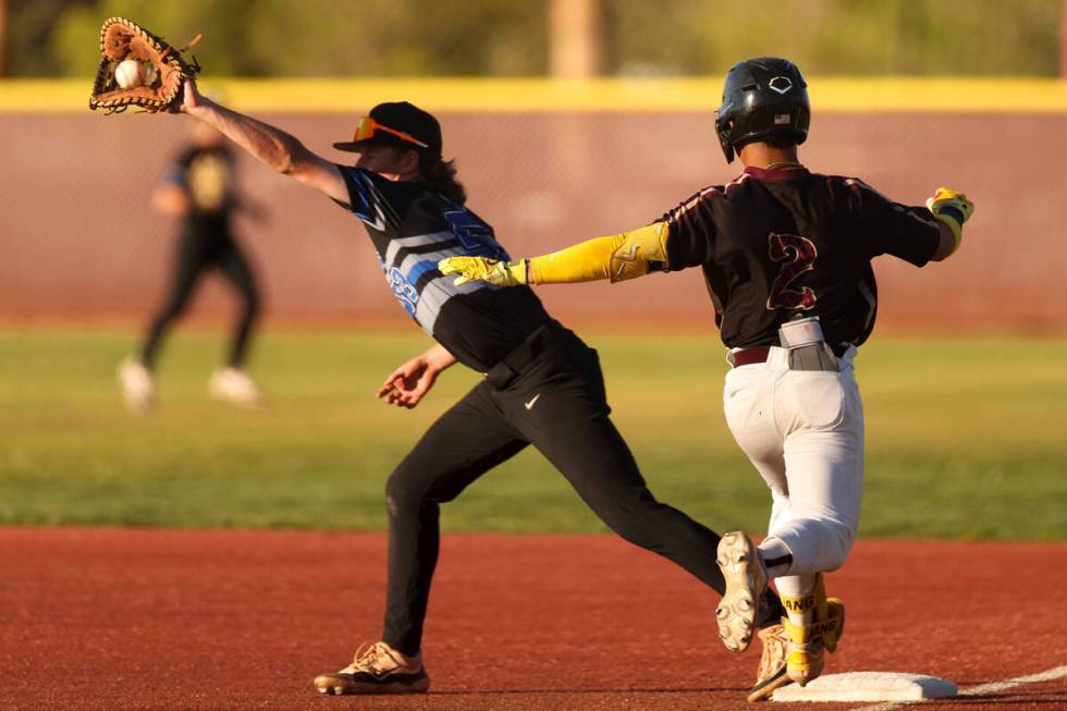 Basic first baseman Randall Riley (53) catches to out Faith Lutheran infielder Alexander Jang ( ...