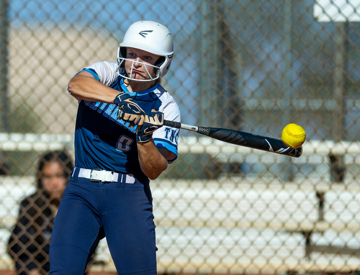 Centennial batter Sloane Merrell (8) connects on a pitch by Palo Verde during the fourth inning ...